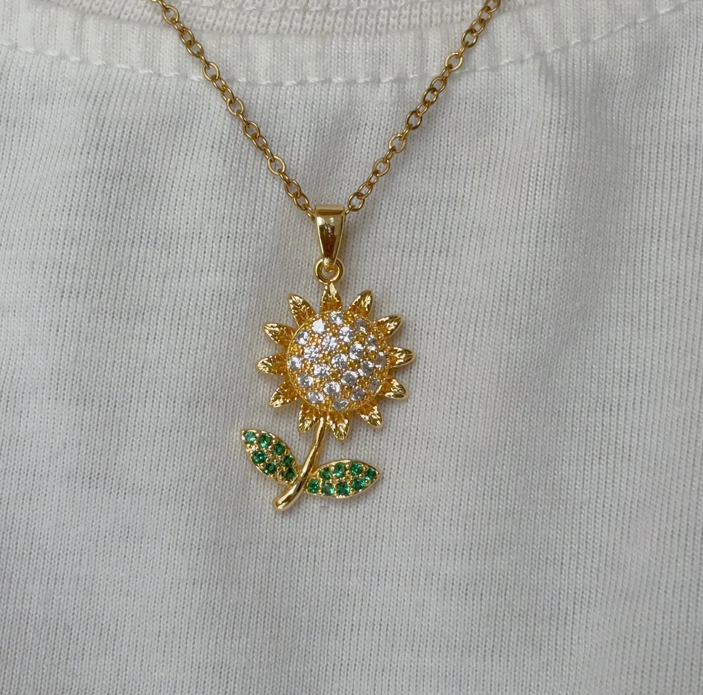 Rotating sunflower necklace