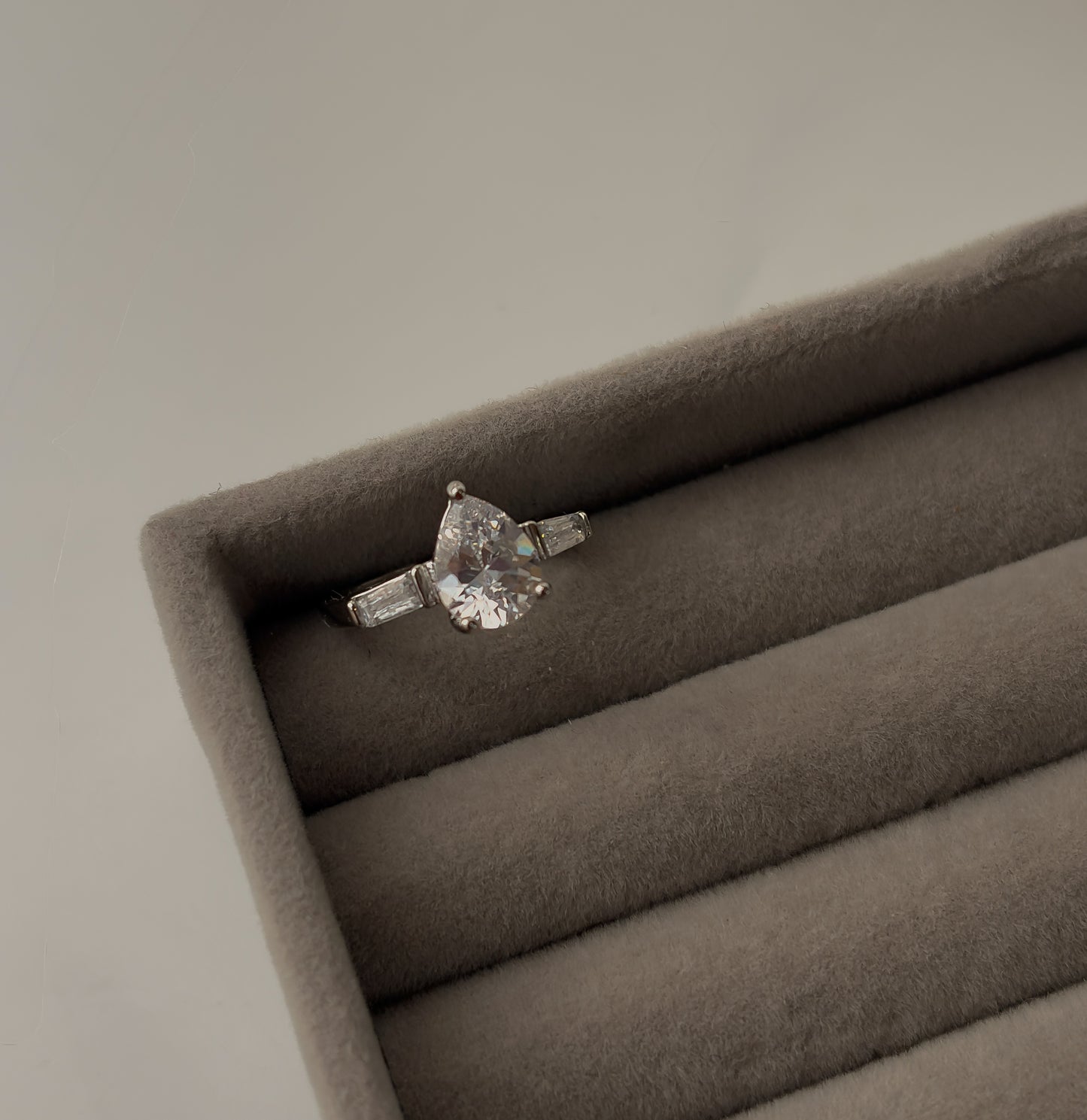 Tear solitaire ring